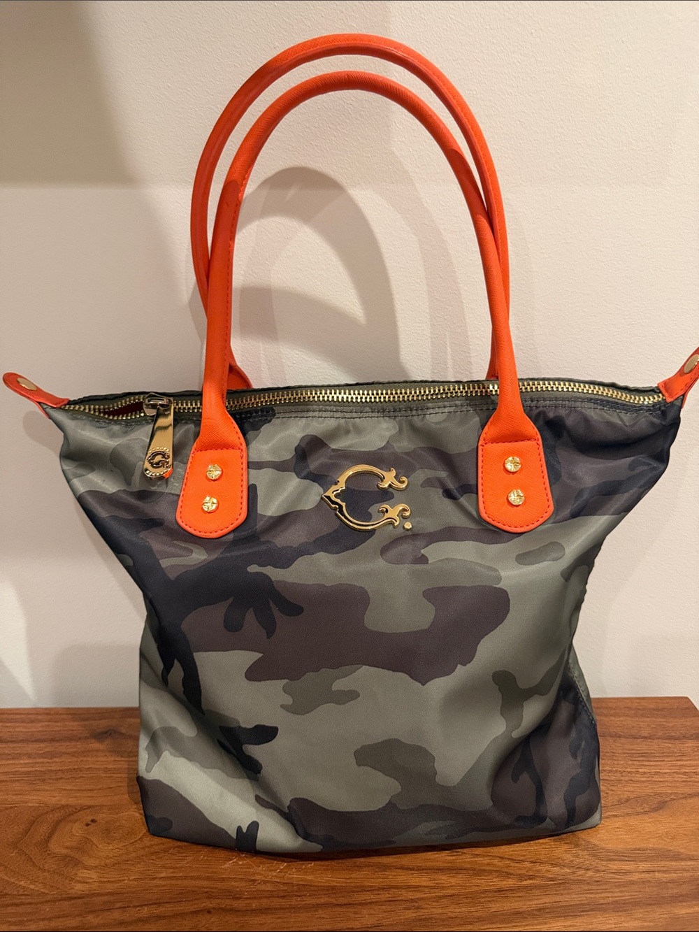 C. Wonder Camouflage Tote with Orange Handles